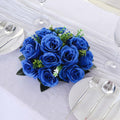 Blue artificial rose centerpiece arrangement for table decor.