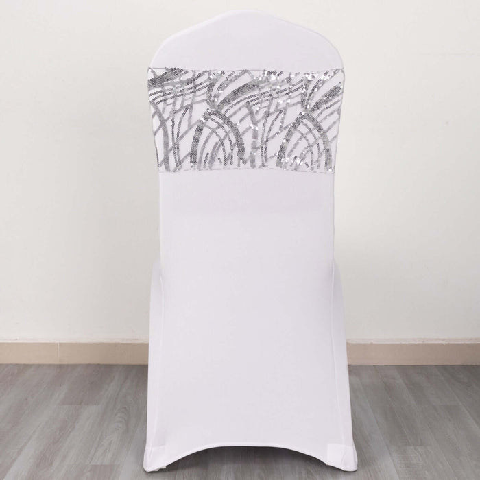 Elegant white chair cover with silver sequin detail.