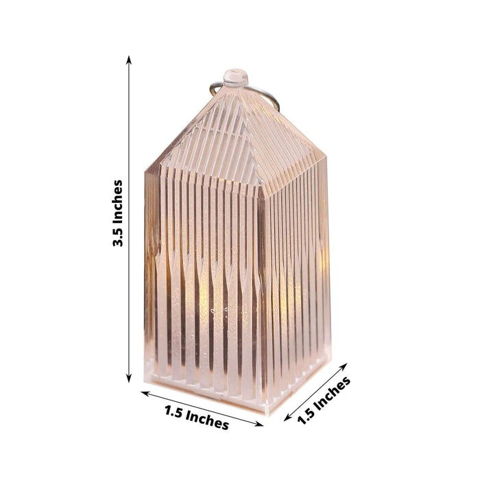 Clear glass lantern with vertical stripes, 3.5 inches tall and 1.5 inches wide.