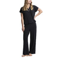 barefoot-dreams-luxe-milk-jersey-piped-short-sleeve-pant-set-black-front