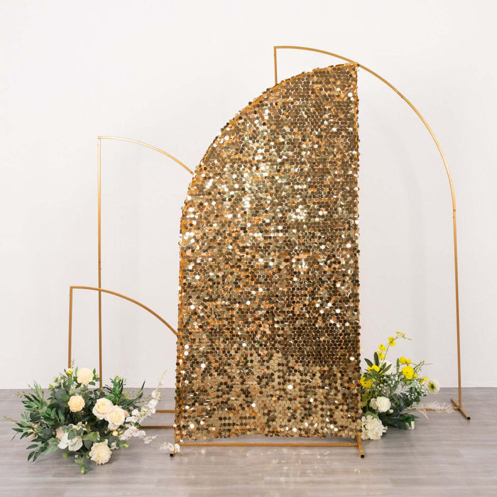 Gold sequin backdrop with floral arrangements for events and photo shoots.
