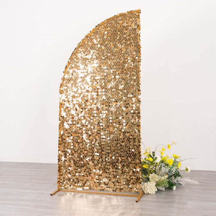 Gold sequin backdrop for events and photography with floral arrangement.