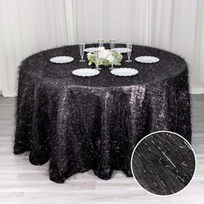 Black round tablecloth with textured detail, perfect for elegant dining setups.