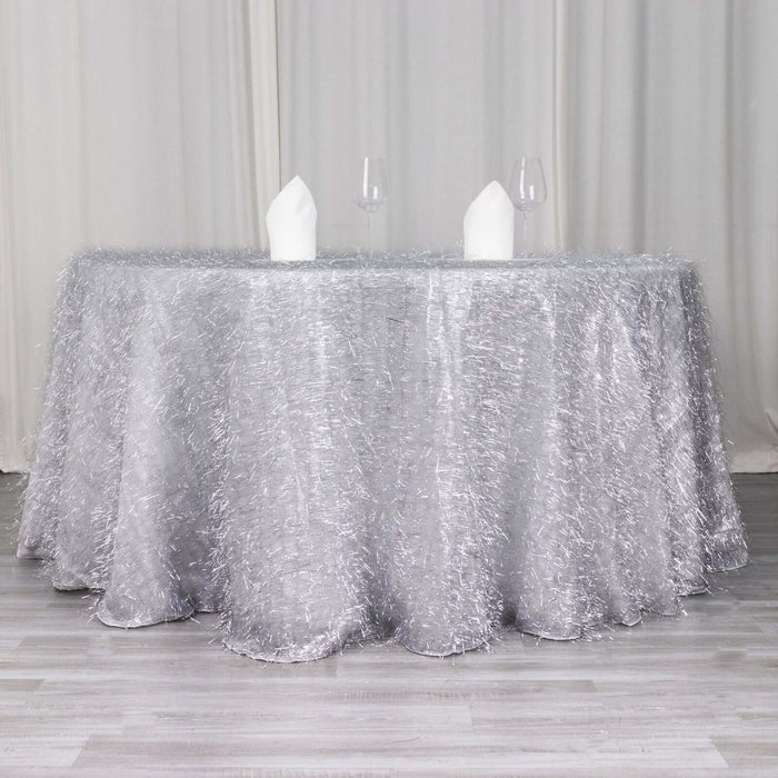 Silver tablecloth with a textured finish, elegantly draped on a table.
