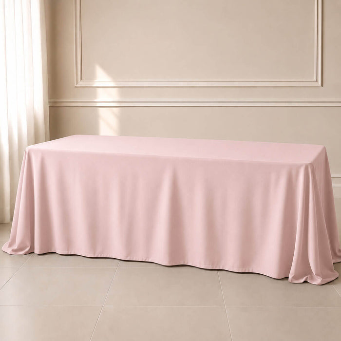 blush rectangle tablecloth on a table