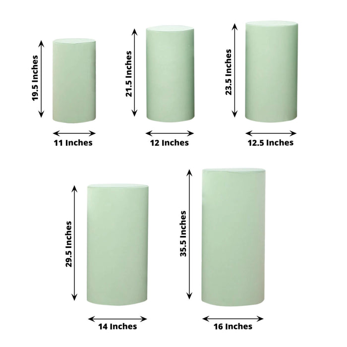 Green cylindrical pedestals in various sizes for display or decoration